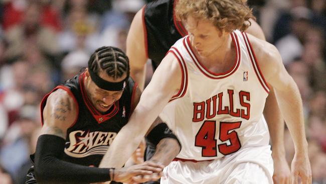 Schenscher battles with NBA legend Allen Iverson during his time in the NBA with Chicago. Picture: File