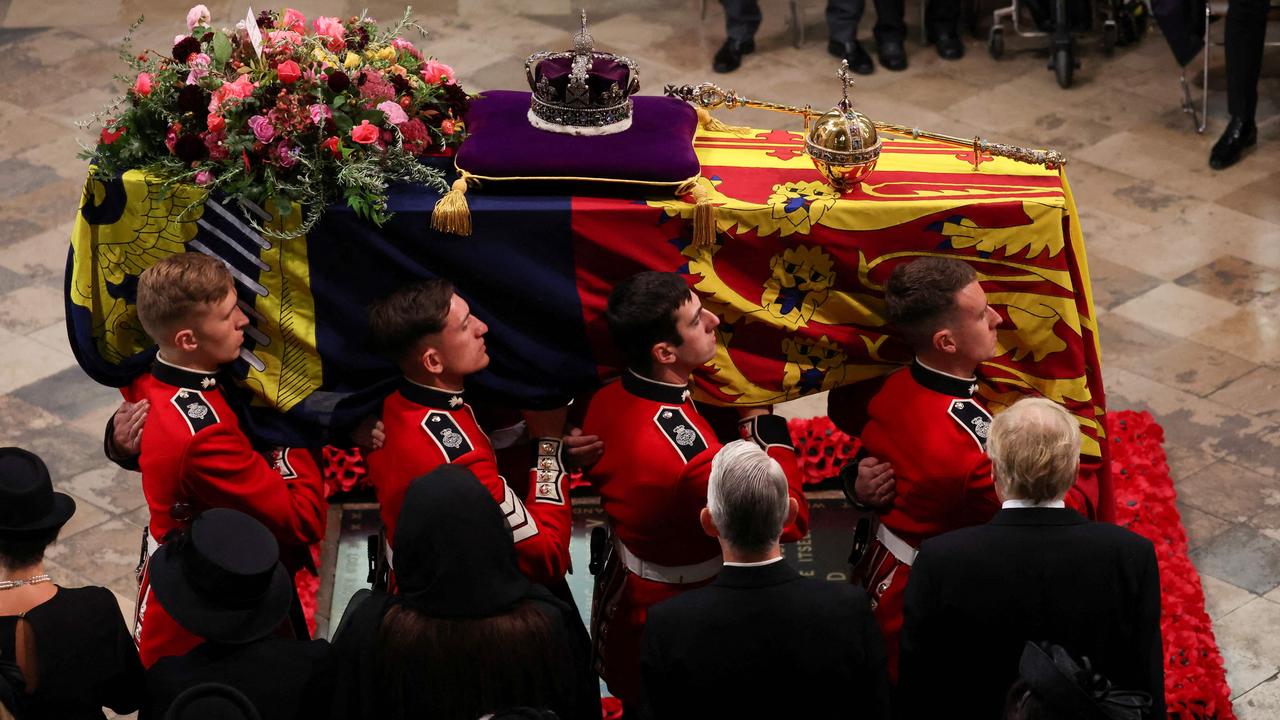 The wreath contains foliage of Rosemary, English Oak and Myrtle (cut from a plant grown from Myrtle in The Queen’s wedding bouquet) and flowers, in shades of gold, pink and deep burgundy, with touches of white, cut from the gardens of Royal Residences. Picture: Phil Noble / POOL / AFP