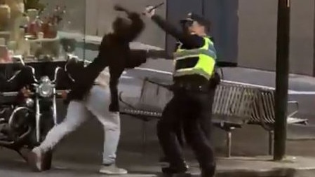 Shire Ali attacks a police officer. Picture: Twitter