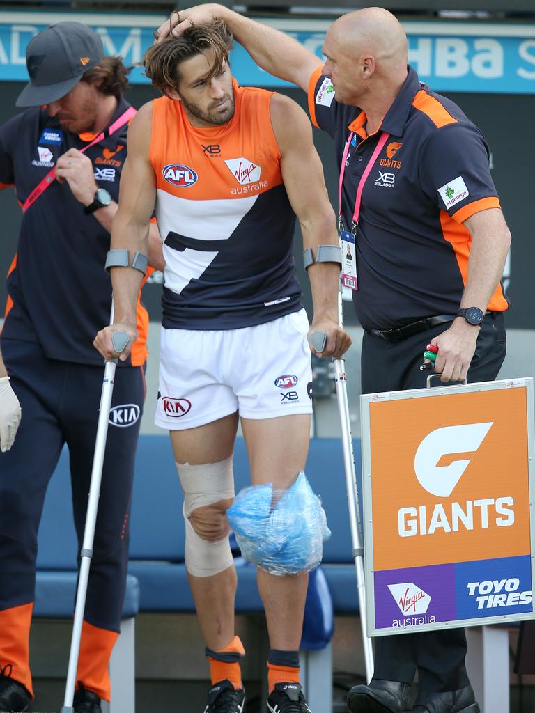 Ward emerged on crutches and was consoled by a GWS official. Picture: Michael Klein.