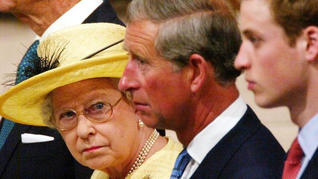 Queen Elizabeth II looks across to Prince Charles and Prince William during the ceremony marking the 50th anniversary of her coronation at Westminster Abbey in London in 2003. Picture: File