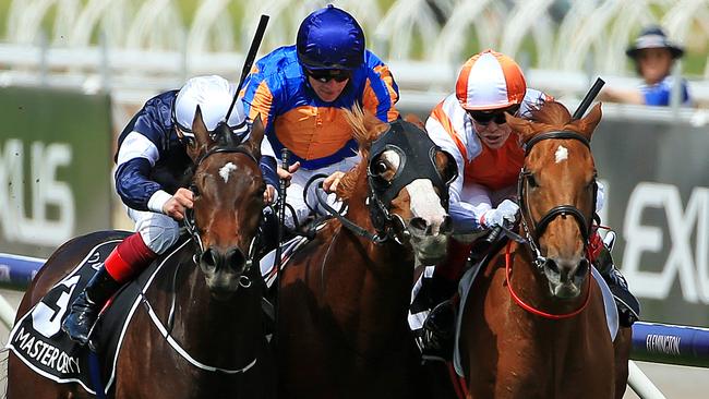 Master Of Reality (left) drifted in onto Il Paradiso and Vow And Declare in the run to the finish line. Picture: Mark Stewart