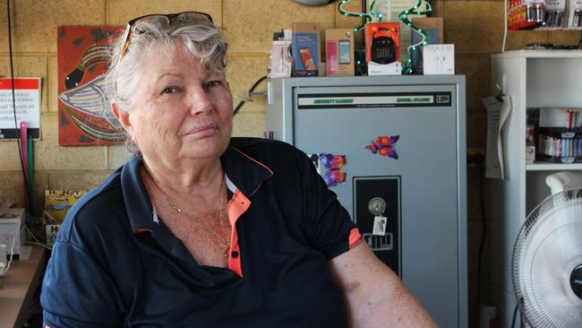 Mataranka Store and Service Station owner Judy Kutschki behind the counter. Picture: Jason Walls