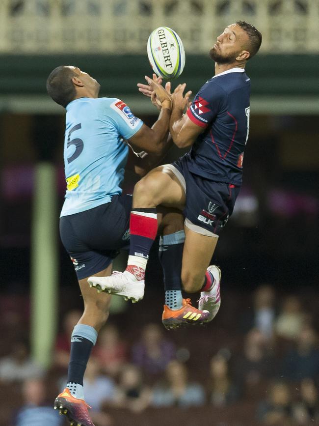 Kurtley Beale and Quade Cooper contest a bomb during last year’s Super Rugby season. Picture: AAP