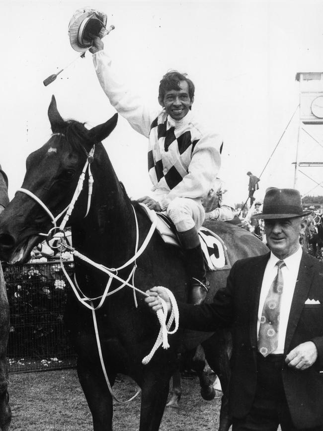 Racehorse Gala Supreme ridden by jockey Frank Reys being led by owner Mr Pat Curtain after winning the Melbourne Cup race at Flemington Racecourse. November 6, 1973. (Copyright Herald-Sun)