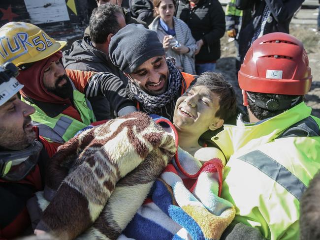 Sixteen-year-old Mahmut Salman is rescued 56 hours after dual earthquakes hit Hatay, Turkey. Picture: Murat Sengul/Anadolu Agency via Getty Images