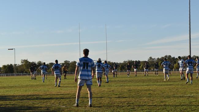 Spectators cheer on as they watch the A Grade Roma vs Condamine match at the Roma Rugby Races at Bassett Park. Picture: Chloe Cufflin.