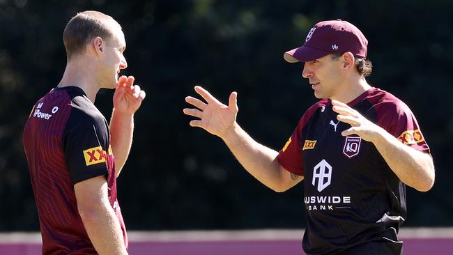 Daly Cherry-Evans and Billy Slater talk tactics during a Maroons State of Origin training session. Picture: Liam Kidston