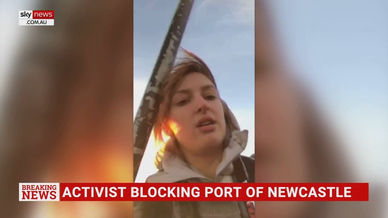 Climate activist blocks rail activity at Port of Newcastle