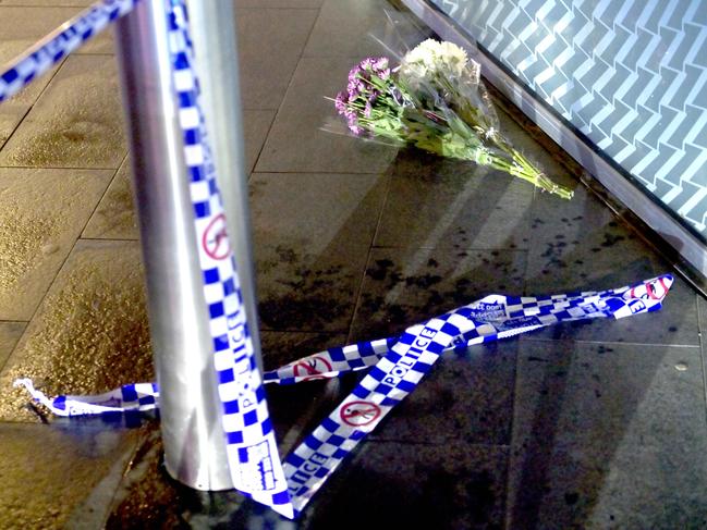 SYDNEY, AUSTRALIA.NewsWire Photos. April 14, 2024.A bunch of flowers is left at the entrance to Westfield at the scene on Sunday after several people died, and many others were injured, including a nine-month-old baby, after being stabbed in an attack at SydneyÃs Westfield Bondi Junction on Saturday. A sole man began running around the busy, six-levelled shopping centre armed with a knife and stabbing people across multiple floors around 3.30pm. The man was shot dead by a ÃheroicÃ police officer who confronted the assailant.Picture: NCA NewsWire / Jeremy Piper