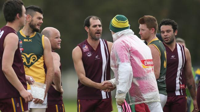 O’Sullivan Beach/Lonsdale full-forward Trevor Rigney, being congratulated last year after kicking his 100th goal for the season, reached 1000 career majors on Saturday. Picture: AAP /Dean Martin