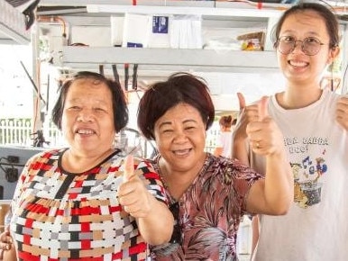 Mary Lei (centre) runs Mary's Laksa which was voted the NT's best food truck in a reader poll. Picture: Darwin Laksa Festival