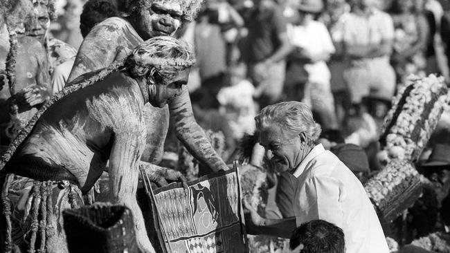 Bob Hawke receives a bark painting from Galarrwuy Yunupingu at the Barunga Festival in Arnhem Land, Northern Territory, June 13, 1988. Picture: The Age/Fairfax /Nine Syndication