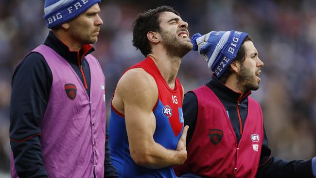 Christian Petracca’s season was over after copping a Darcy Moore knee in the ribs late in June. Picture: Michael Klein