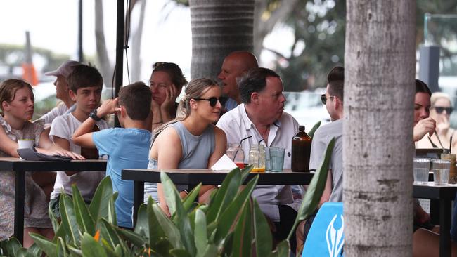 Some cafes were busy but many reported a downturn. Photograph: Jason O'Brien.