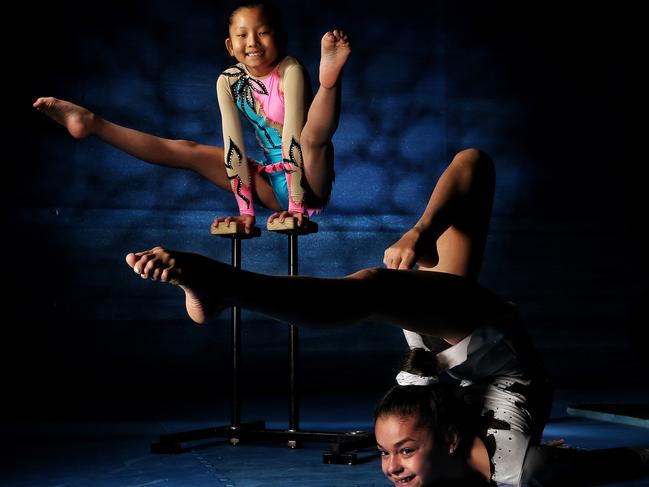 Acrobatic Gymnasts Kathy Lee (top), 9, and Lauren Andonovski, 12, from Maribynong's Team Adrenalin on Monday, May 8, 2017, in Footscray, Victoria, Australia. They have been selected to represent Victoria at the 2017 Australian Gymnastics Championships at Hisense Arena later this month. Picture: Hamish Blair