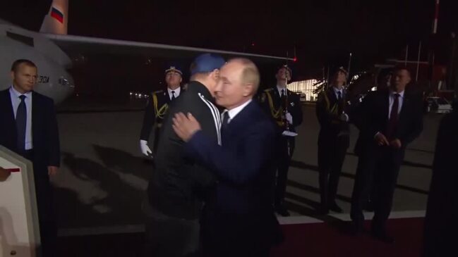 Putin meets swapped Russians on the tarmac in Moscow