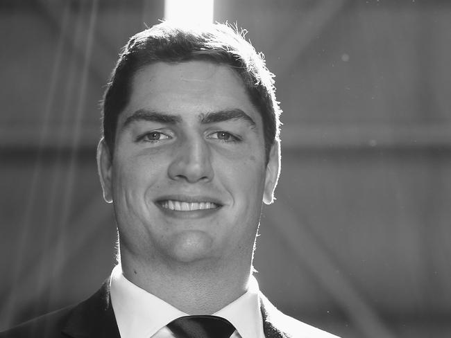 SYDNEY, AUSTRALIA - AUGUST 21: (EDITORS NOTE: Image has been converted to black and white.) Rob Simmons poses during the Australian Wallabies Rugby World Cup squad announcement at Hangar 96, Qantas Sydney Jet Base on August 21, 2015 in Sydney, Australia. (Photo by Mark Kolbe/Getty Images)