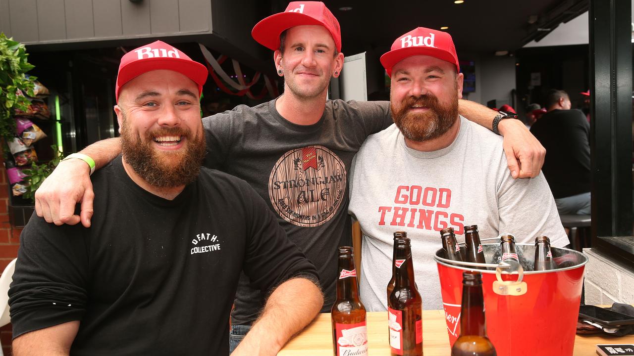 Superbowl fans James Rogers, Chris Starns and Daniel Connor at the Sporting Globe. Picture: Alison Wynd