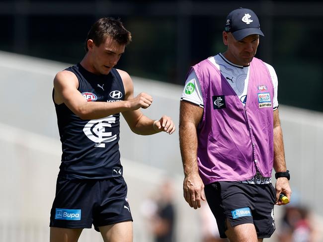 MELBOURNE, AUSTRALIA - FEBRUARY 22: Jagga Smith of the Blues limps from the field during the 2025 AFL match simulation between the Carlton Blues and St Kilda Saints at Ikon Park on February 22, 2025 in Melbourne, Australia. (Photo by Michael Willson/AFL Photos via Getty Images)