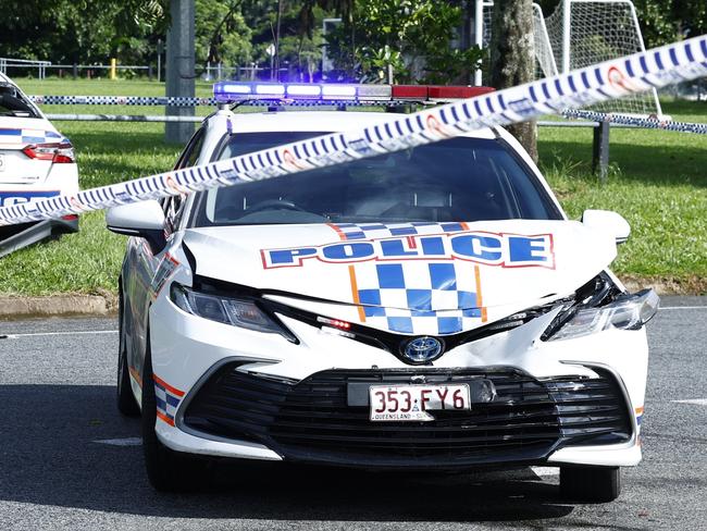 CAIRNS, AUSTRALIA - NCA NewsWire Photos - 27 MARCH, 2024: Police officers attend the scene of a car crash involving a stolen police and multiple other vehicles at the intersection of Torino and Sondrio Streets, Woree. Picture: NCA NewsWire / Brendan Radke