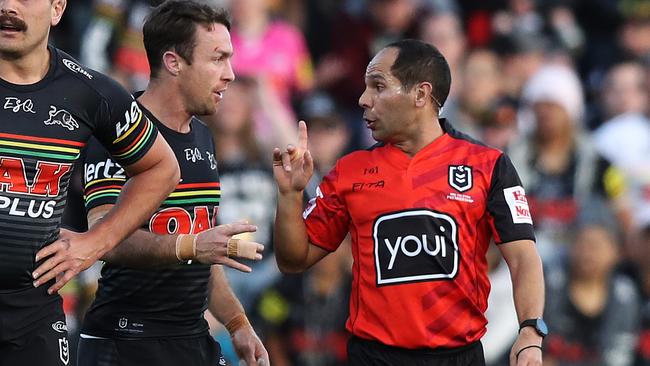 James Maloney gets told off by referee Ashley Klein. Photo: Brett Costello