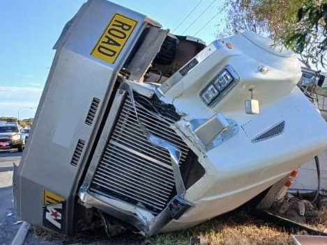 Commuters have been warned to expect travel pain after a rubbish truck rolled at the southern end of the Southern Expressway on Monday morning. Picture: SAPOL