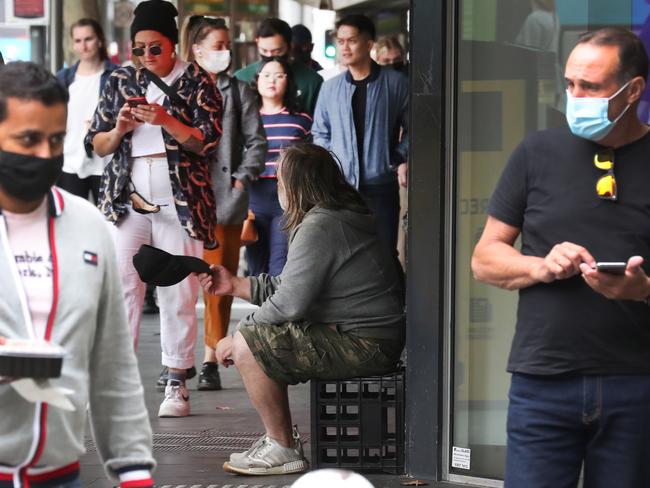 MELBOURNE, AUSTRALIA- NewsWire Photos FEBRUARY 2, 2021:  A man begs in Melbourne CBD as poverty in Australia is on the increase not helped by the COVID-19 pandemic. .Picture: NCA NewsWire/ David Crosling