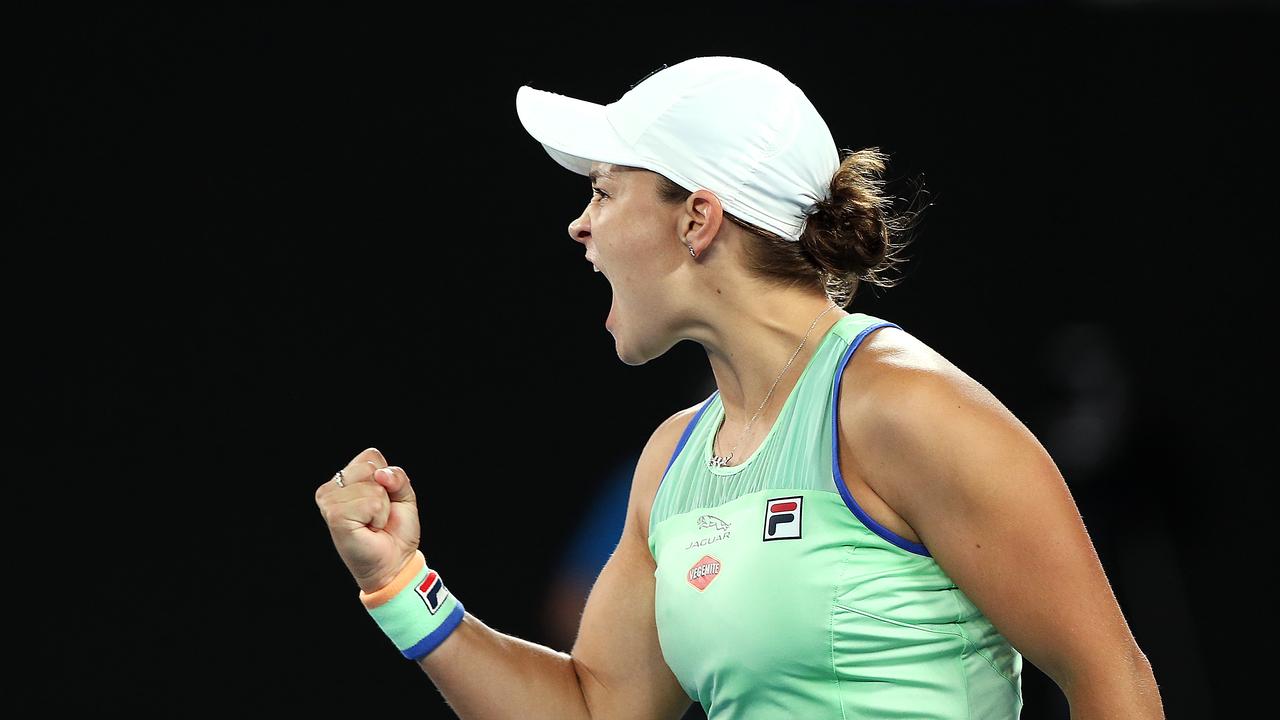 Ash Barty roars after winning her fourth round match.