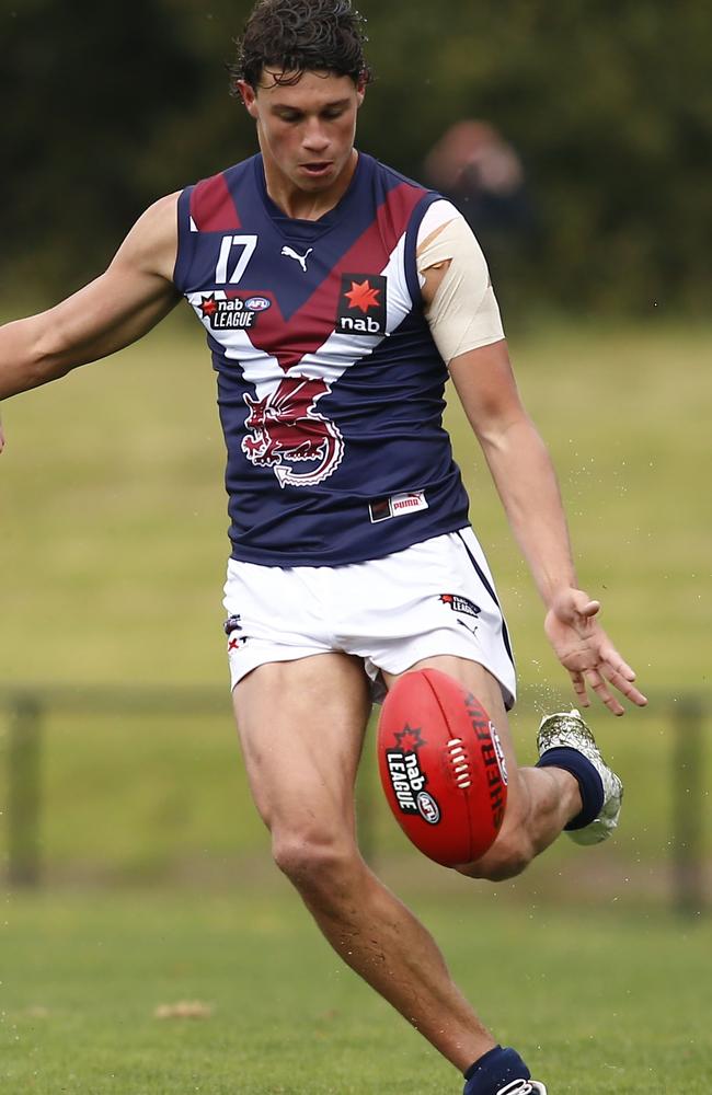 Finn Callaghan takes a kick for the Dragons. Photo: Cameron Grimes/AFL Photos