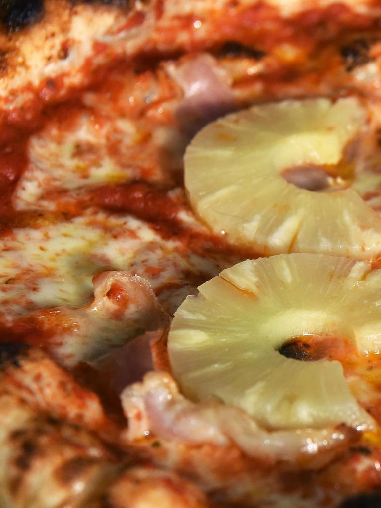 Pizzeria charge $A200 for a Hawaiian to deter customers from having controversial pineapple topping.