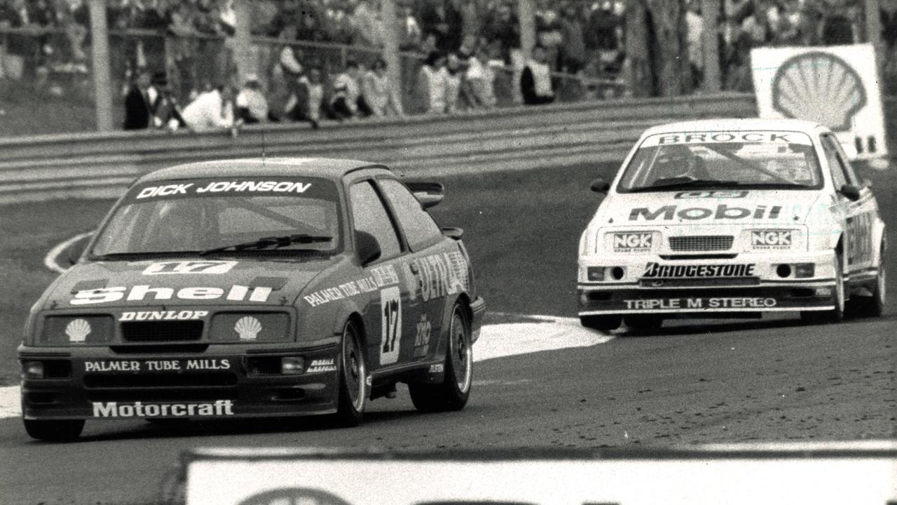 The legendary Dick Johnson leading Peter Brock in 1989 at Sandown.