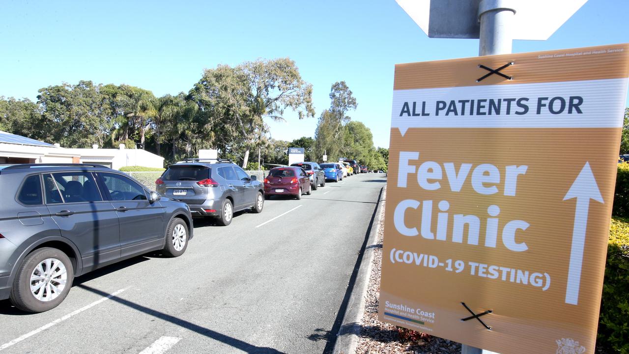 People in cars queue for Covid-19 testing. Picture: Steve Pohlner