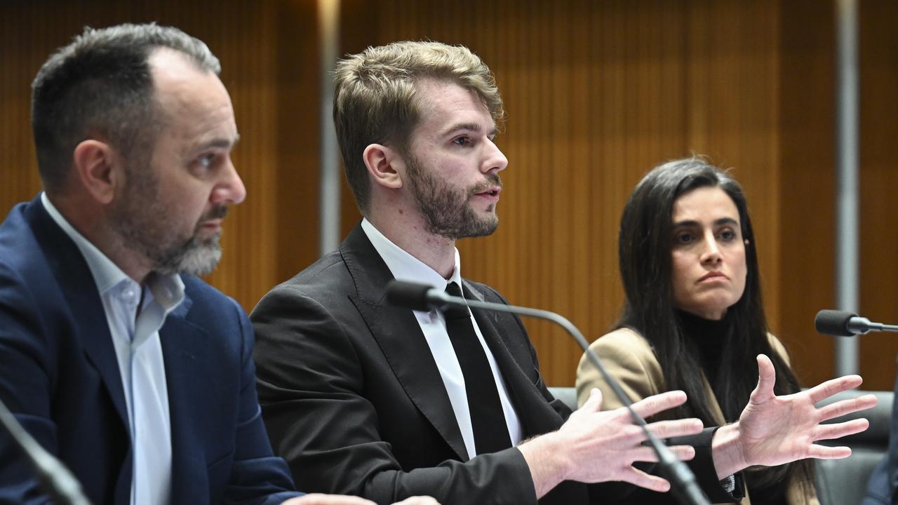 Voice actor Cooper Mortlock (centre) told a previous committee hearing about a YouTube animated show he worked on using AI and his voice to create additional episodes after his contract had been cancelled. Picture: NewsWire / Martin Ollman