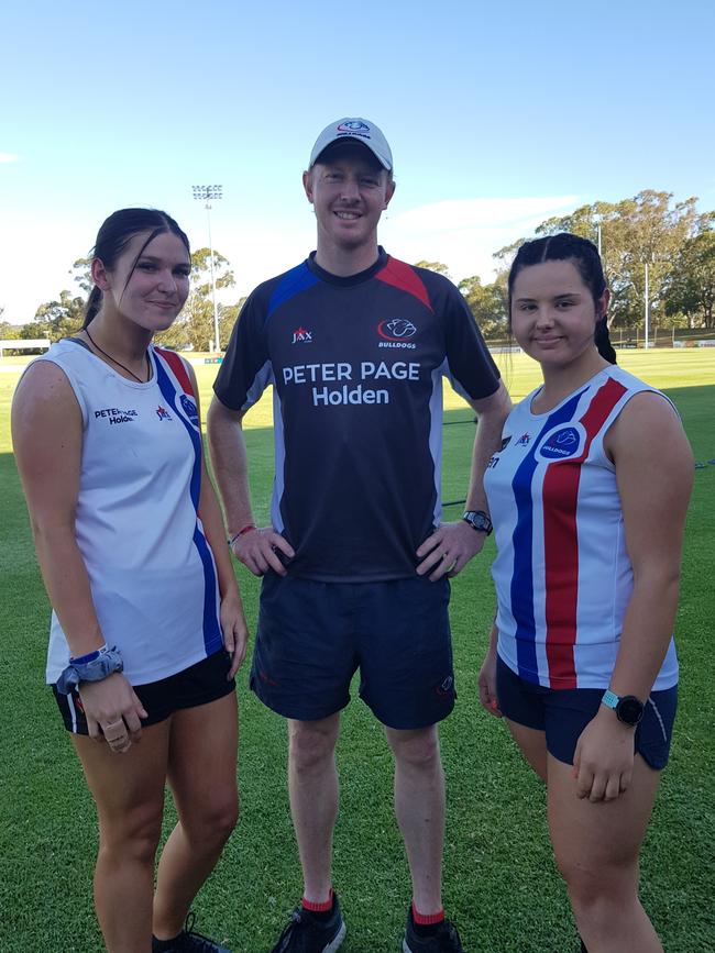 Central District SANFLW coach Shaun Ribbons with players Shannon Murphy and Abbey Scheer. The trio is keen for the Bulldogs’ inaugural season to start. Picture: Belinda Gray