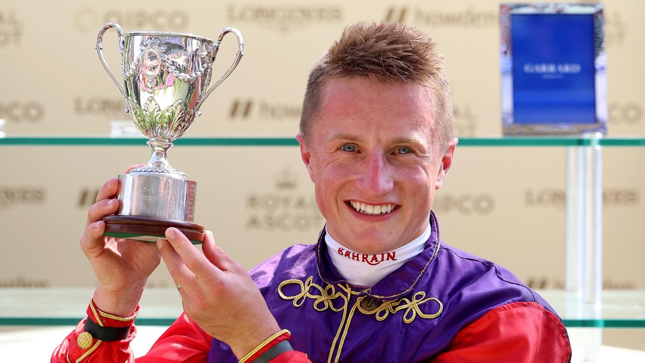 Tom Marquand was all smiles after collecting the King George V Stakes trophy. Picture: Tom Dulat–Getty Images for Ascot Racecourse