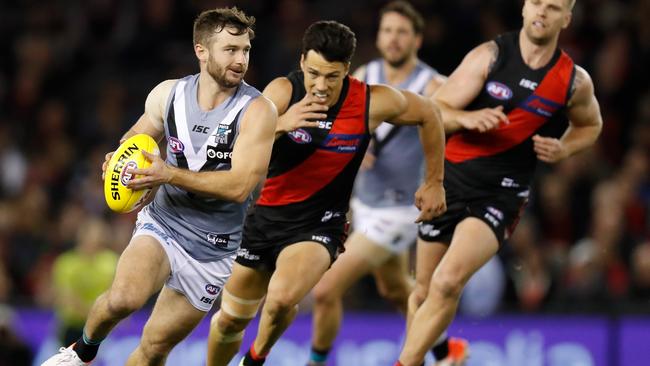 Sam Gray bursts away from Essendon’s Dylan Shiel and Jake Stringer during this year’s round 20 clash at Marvel Stadium. Picture: MICHAEL WILLSON