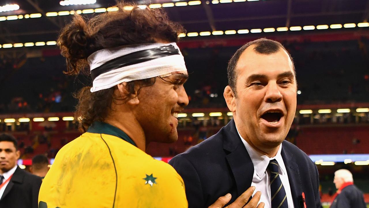 Karmichael Hunt of Australia shares a joke with Michael Cheika in 2017 in Cardiff.