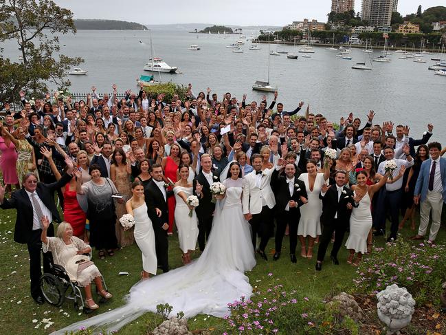 The happy couple with their wedding guests. Picture: Toby Zerna