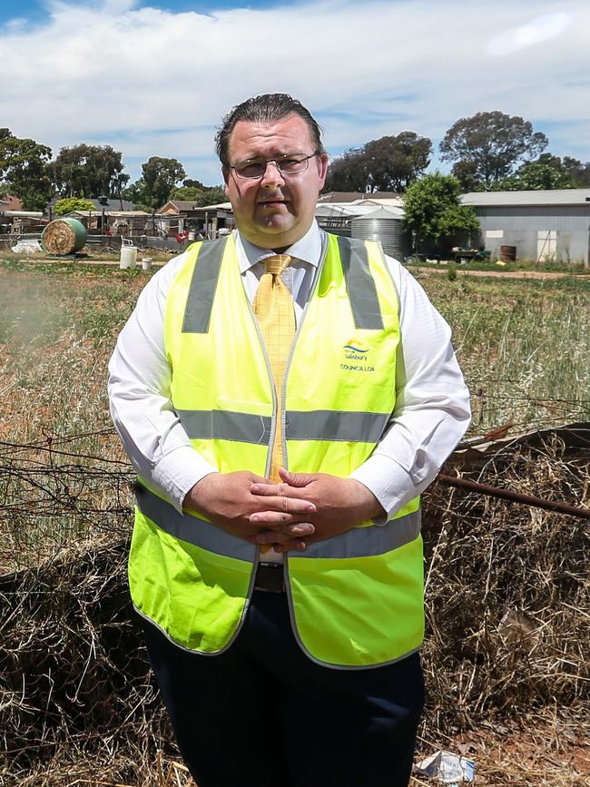 Salisbury deputy mayor Chad Buchanan at a site on Kings Road, Salisbury Downs in 2021 expressing concerns about a proposed service station. Picture: File