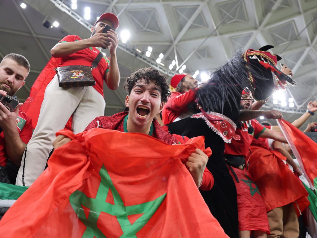 Hugs all around: Hakimi and Bono embrace after Portugal win