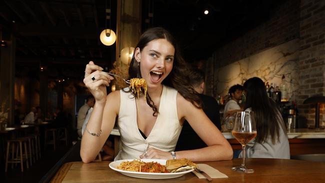 Sienna Lyon enjoying a Bay Lobster Capelli at Grana at Circular Quay. There are signs of life in Sydney's CBD with popular restaurants extending their hours to open on Sundays. Grana will open for pasta lunches on Sunday in March. Picture: Richard Dobson