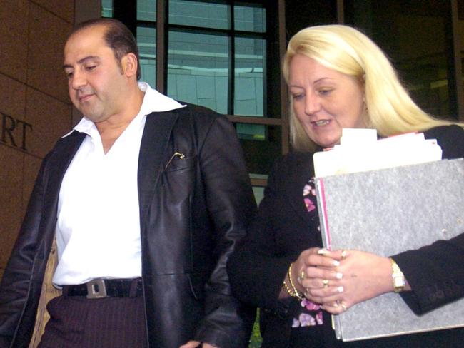 Tony Mokbel  leaves Melbourne Magistrates Court with his lawyer, Nicola Gobbo.