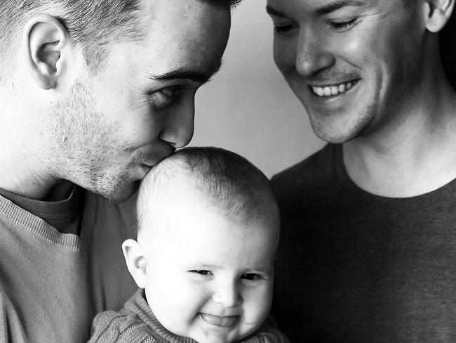 Rhiannon’s brother Clinton and his partner Callum with their first daughter Zara. Picture: Caters News