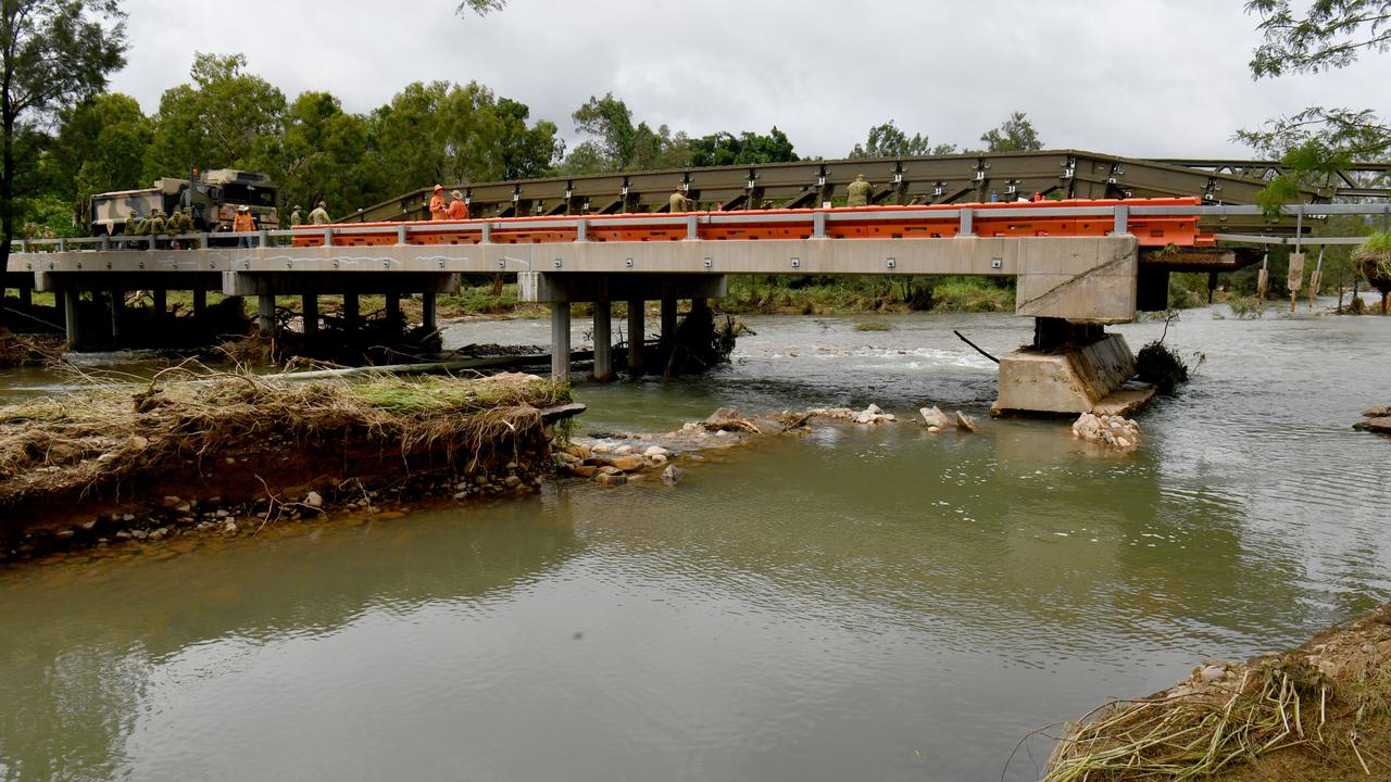 Search for man near Townsville after driving into flood waters