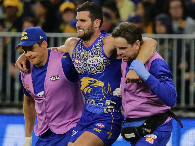 PERTH, WESTERN AUSTRALIA - JUNE 02:  Jack Darling of the Eagles is assisted off the field with a right ankle injury during the round 11 AFL match between the West Coast Eagles and the St Kilda Saints at Optus Stadium on June 2, 2018 in Perth, Australia.  (Photo by Will Russell/AFL Media/Getty Images)