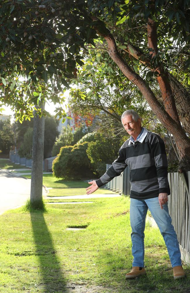 Brian Golland is annoyed with council's footpath project. Picture: Alison Wynd