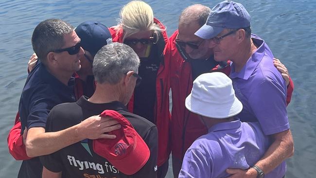 Friends of two sailors killed during the Sydney to Hobart gather for a tribute at Constitution dock in Hobart.