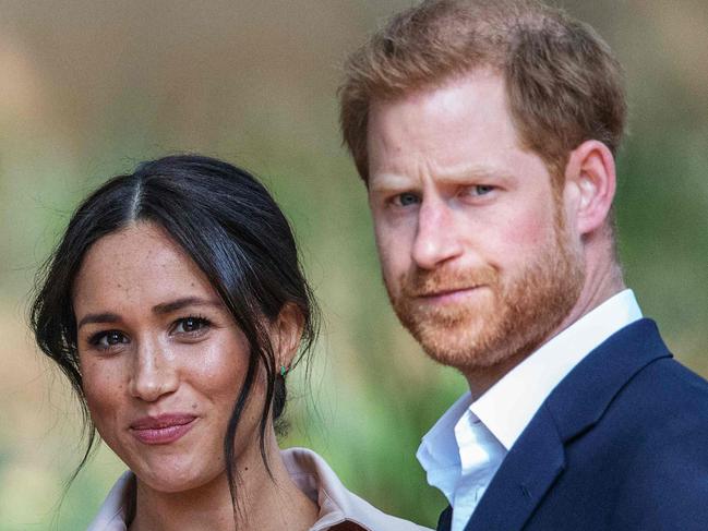 (FILES) In this file photo taken on October 02, 2019 Britain's Prince Harry, Duke of Sussex(R) and Meghan, the Duchess of Sussex(L) arrive at the British High Commissioner residency in Johannesburg where they  will meet with Graca Machel, widow of former South African president Nelson Mandela, in Johannesburg, on October 2, 2019. - Prince Harry Meghan Markle announced Sunday the birth of their daughter Lilibet Diana, who was born in California after a year of turmoil in Britain's royal family. "Lili is named after her great-grandmother, Her Majesty The Queen, whose family nickname is Lilibet. Her middle name, Diana, was chosen to honor her beloved late grandmother, The Princess of Wales," said a statement from the couple. (Photo by Michele Spatari / AFP) / France OUT until 2019-10-17T00:00:00.000+02:00