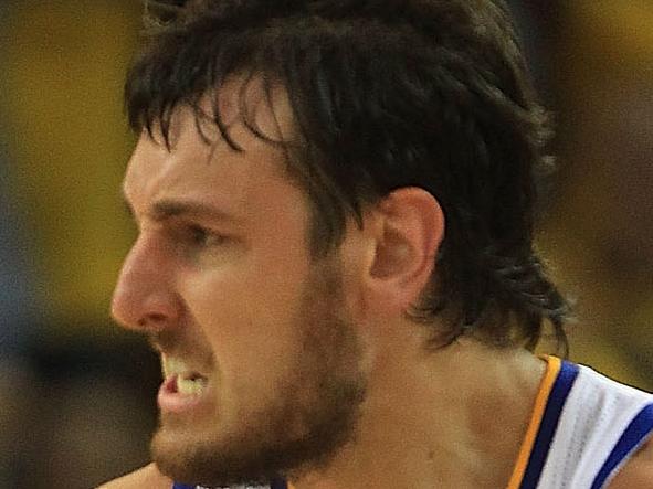 OAKLAND, CA - APRIL 28: Andrew Bogut #12 of the Golden State Warriors celebrates against the Denver Nuggets during Game Four of the Western Conference Quarterfinals of the 2013 NBA Playoffs at ORACLE Arena on April 28, 2013 in Oakland, California. NOTE TO USER: User expressly acknowledges and agrees that, by downloading and or using this photograph, User is consenting to the terms and conditions of the Getty Images License Agreement. (Photo by Jed Jacobsohn/Getty Images)